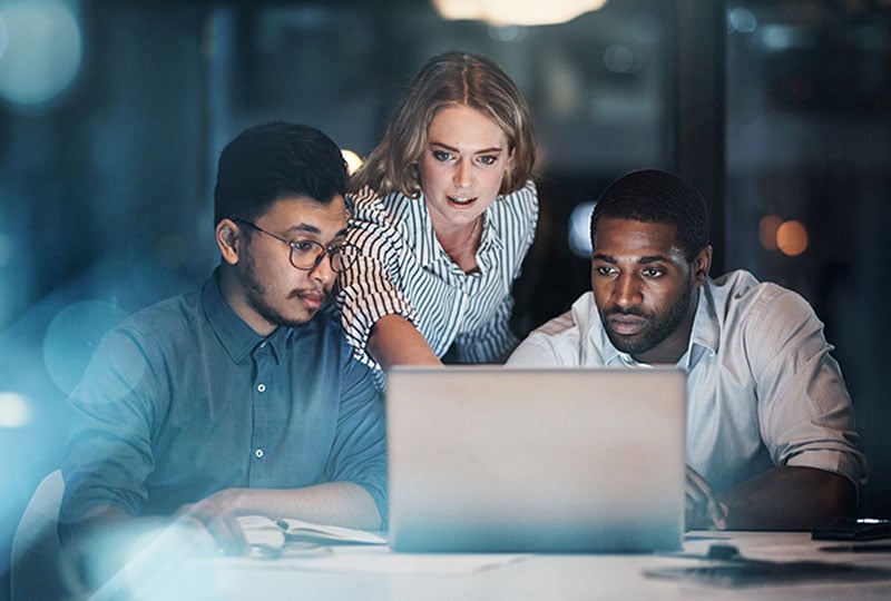 collaborating over a laptop
