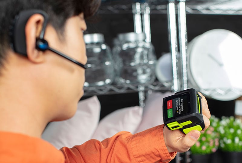 Person using a voice enablement device